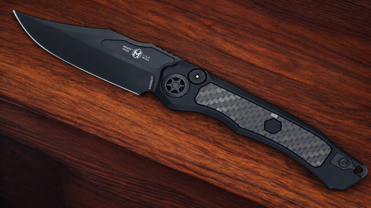 HERETIC - Wraith V4 DLC Bowie in Black W/ Glow Carbon Fiber Inlays & Tritium Button. Model # H002-6A- GLO/CF