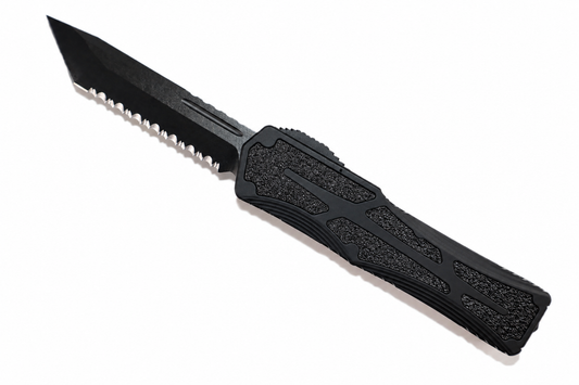 HERETIC - Colossus in Tactical Black W/ Black Grip Inlays & DLC Full Serrated Tanto Edge Blade Finish. Model # H040-6C-T
